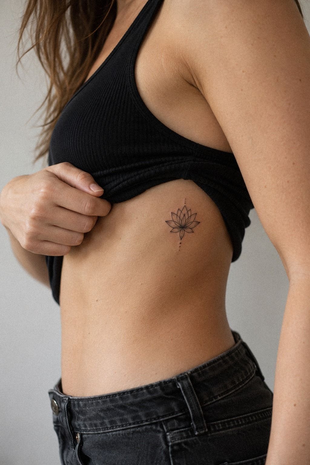 Build a Unique Fine Line Lotus Along the Spine