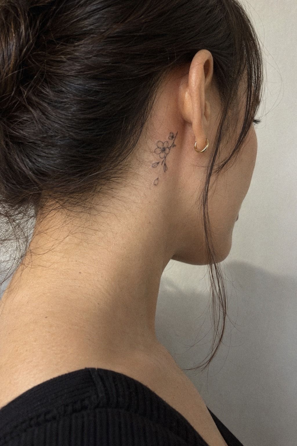 Could a Tiny Cherry Blossom Tattoo Behind the Ear Work?